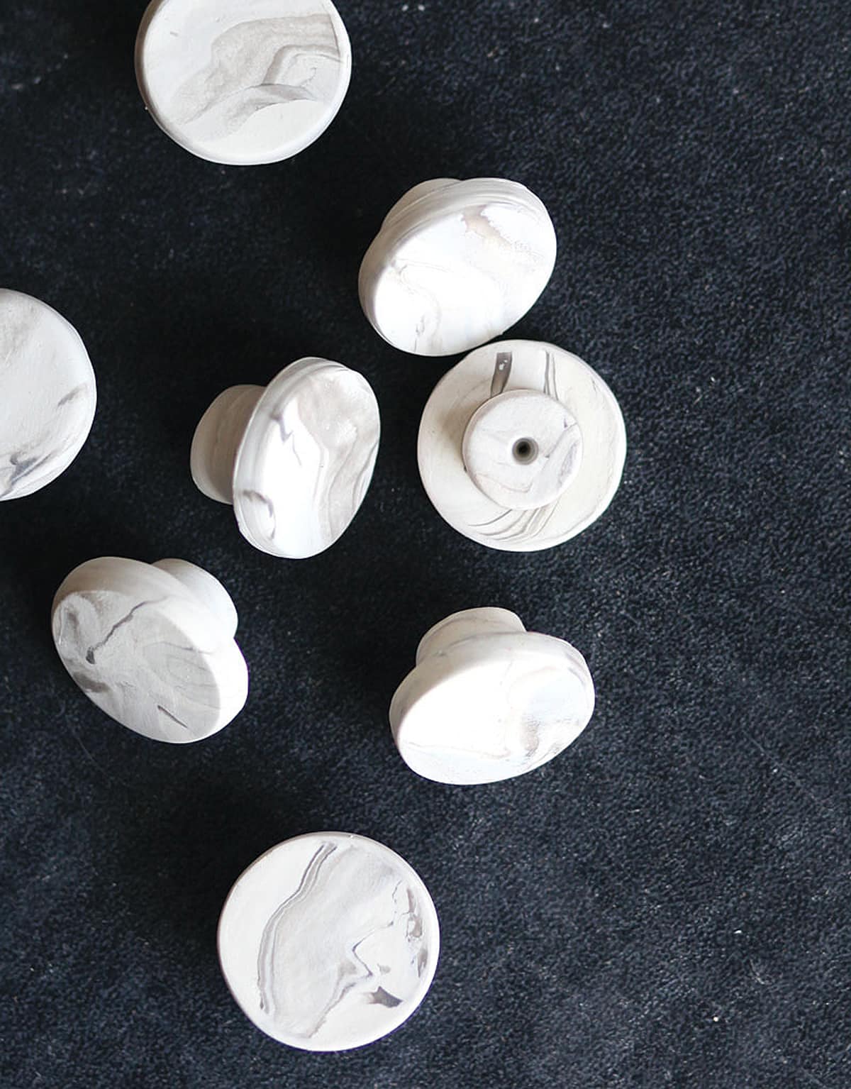 eight faux marble knobs