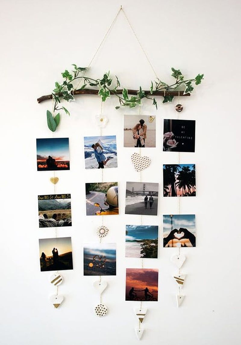 photo wall hanger decorated with tree branches