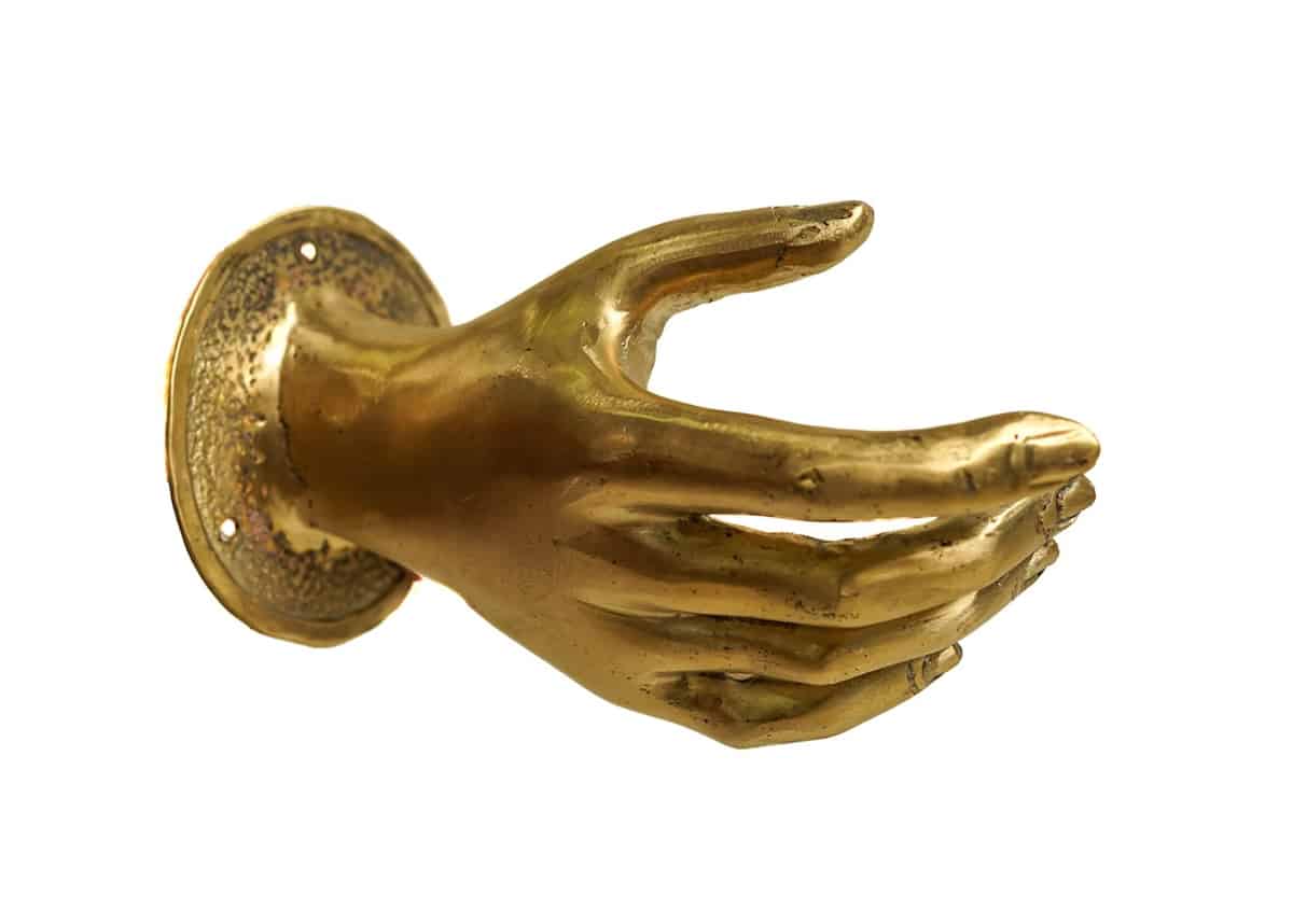yellow hand-shaped door handle