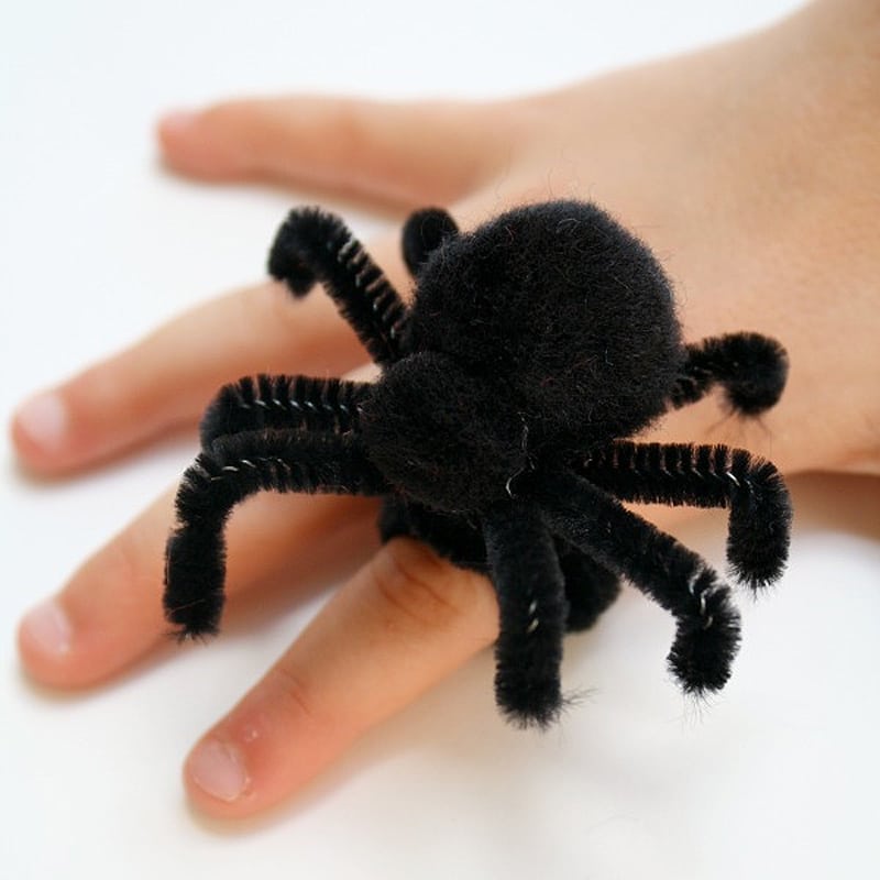 spider ring with pom poms