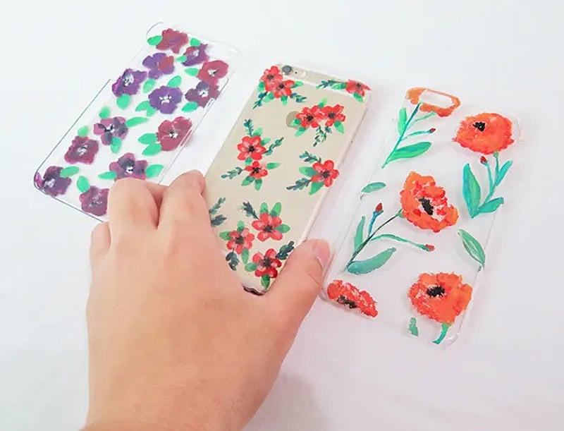 three flower-shaped silicone phone cases