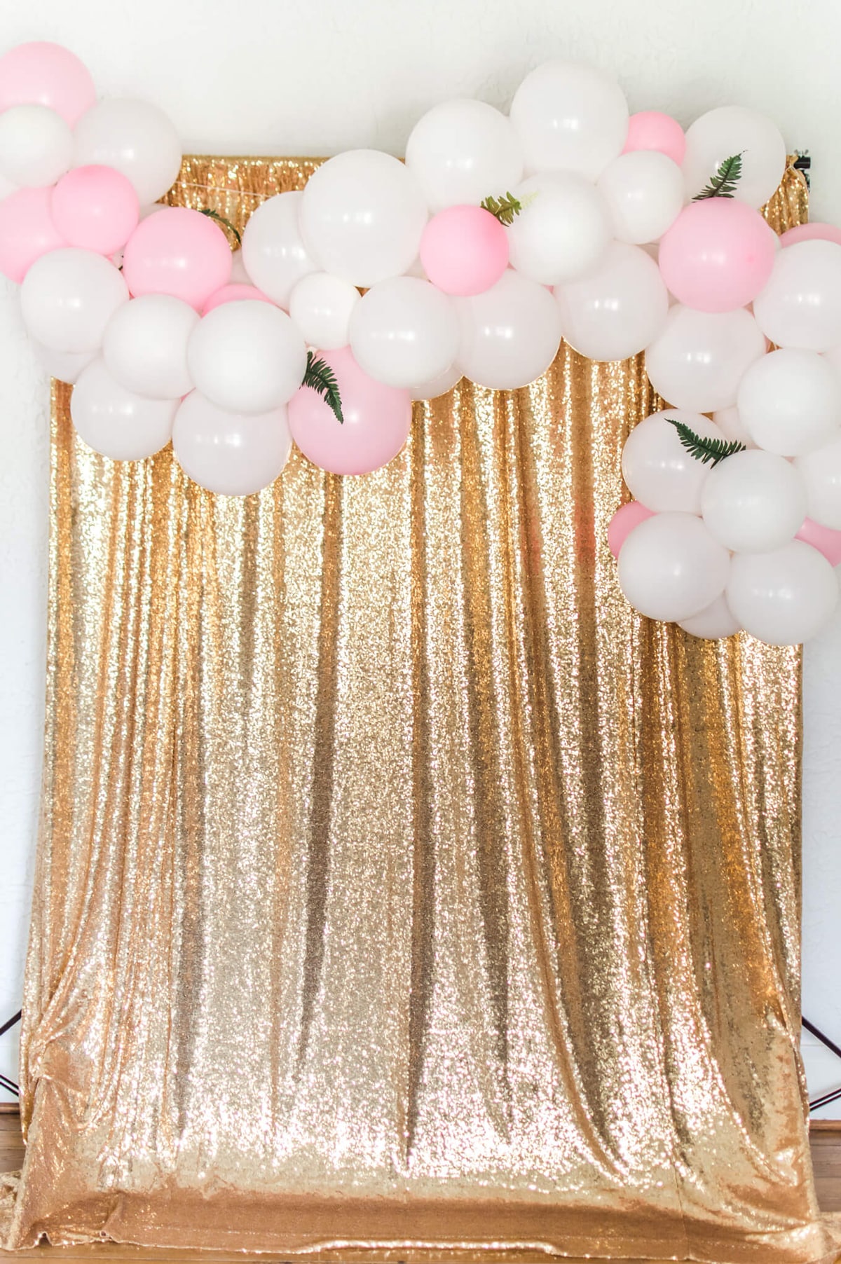 white and soft pink balloon garland