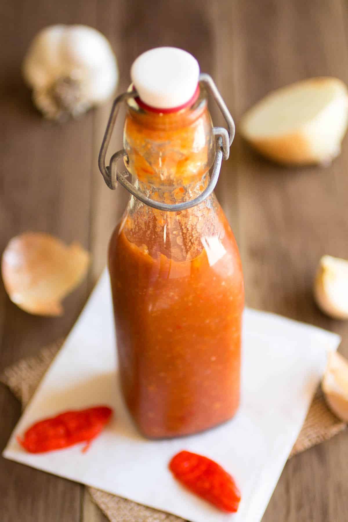 Ghost Pepper Hot Sauce in a glass bottle.