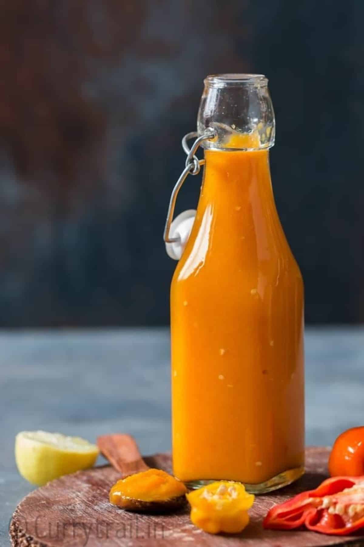 Mango Habanero Hot Sauce in a glass bottle.
