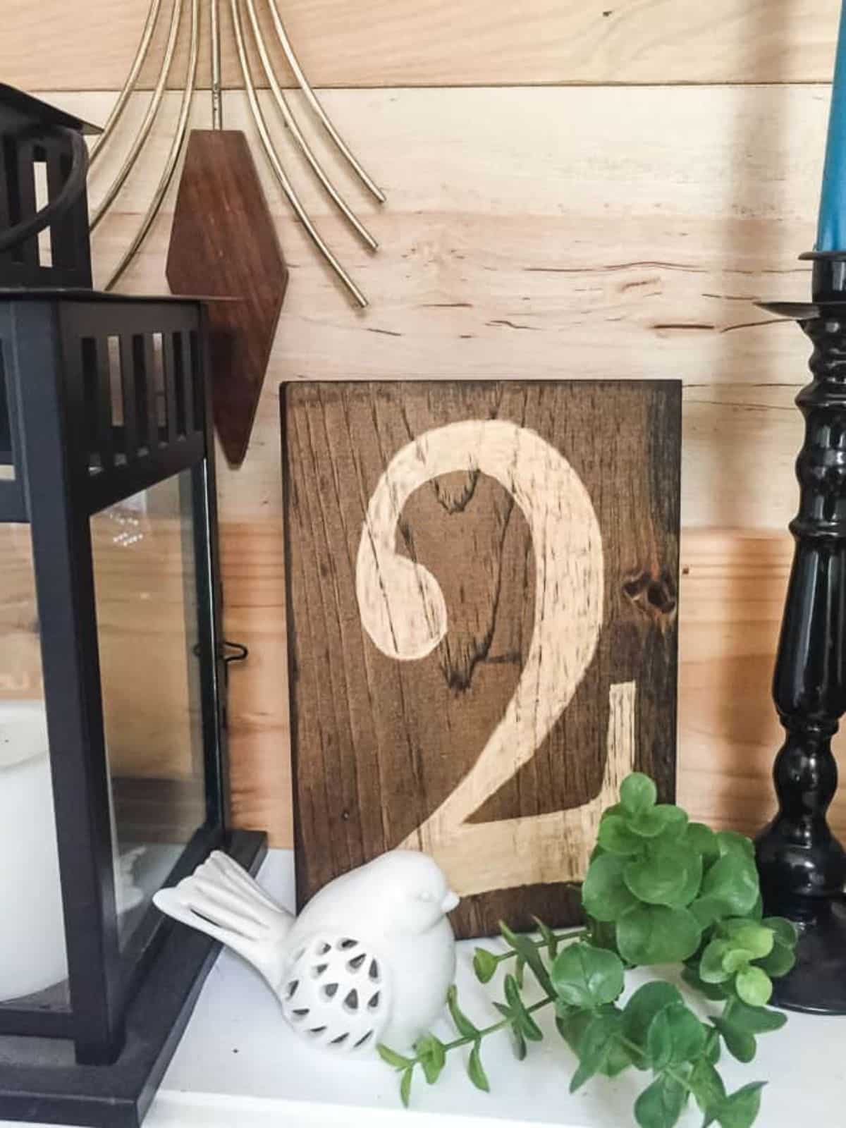 Hand-carved wooden sign.